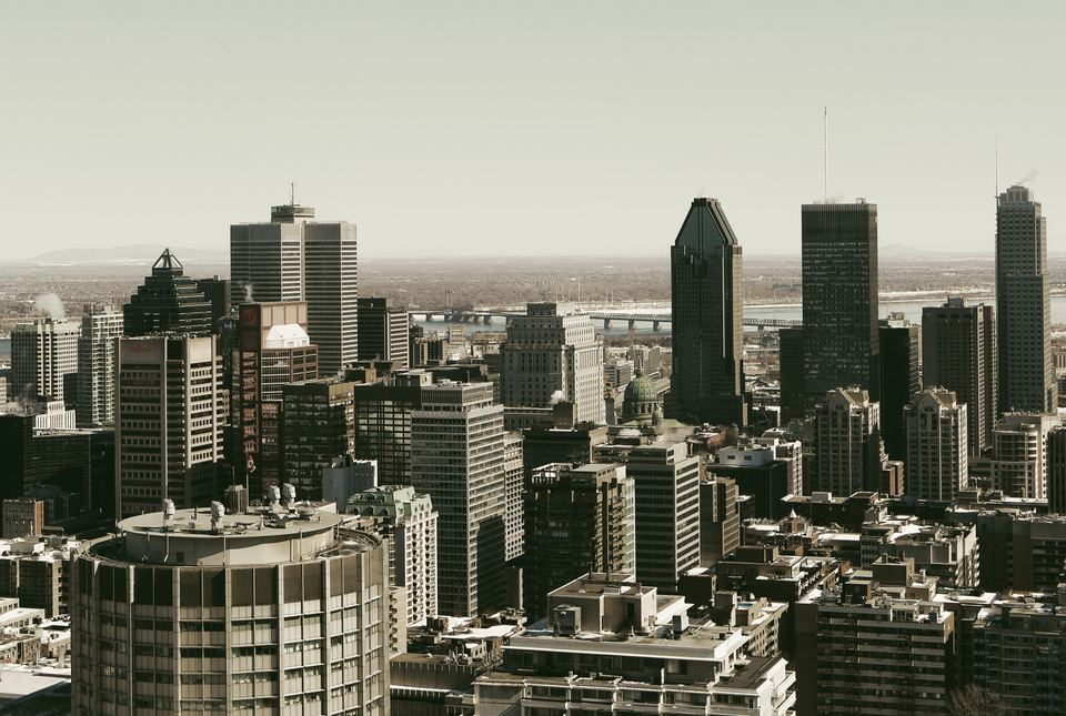 Elevated view overlooking densely packed city skyscrapers.