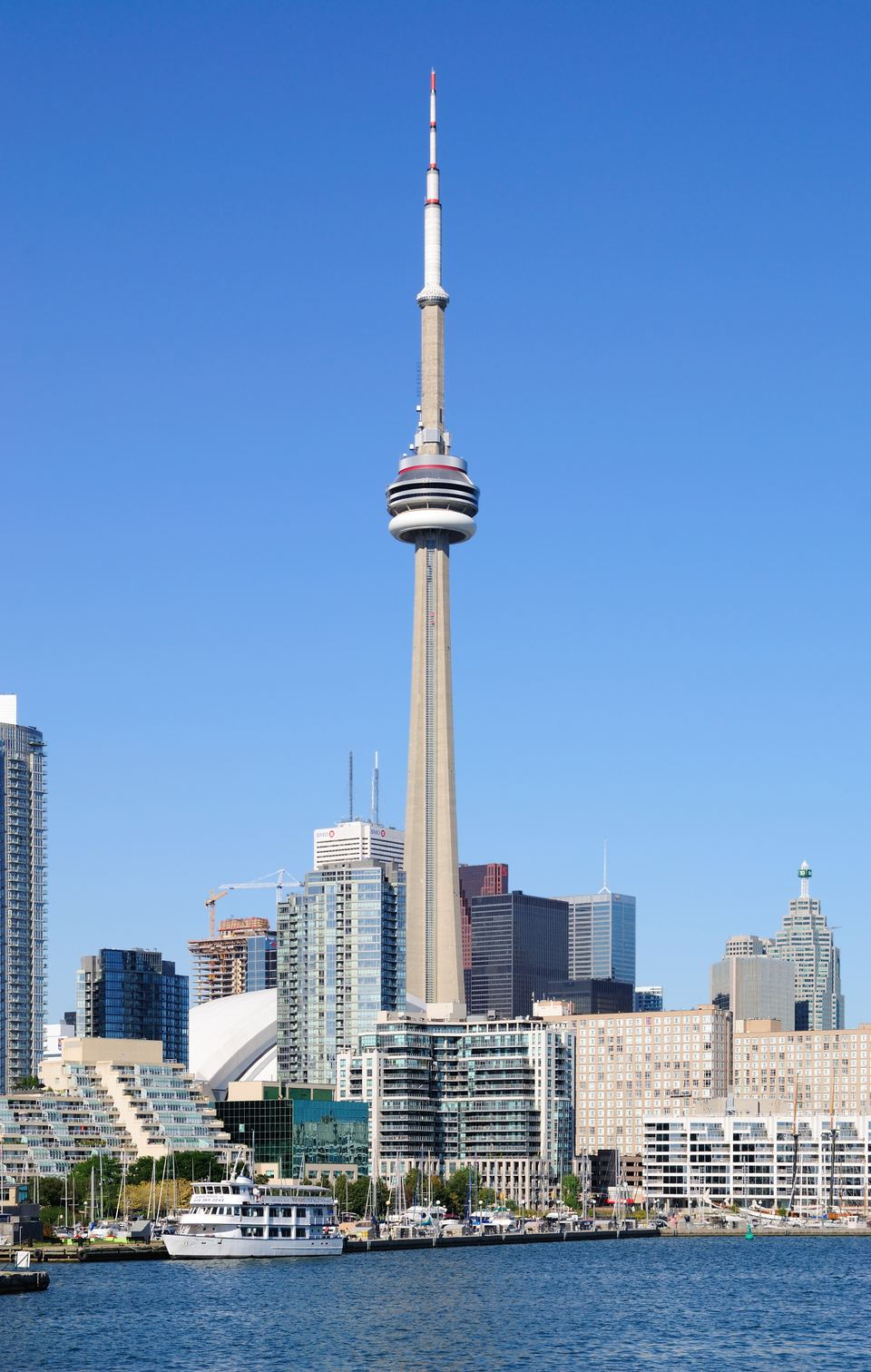 Daytime view of the CN Tower and downtown waterfront in Toronto