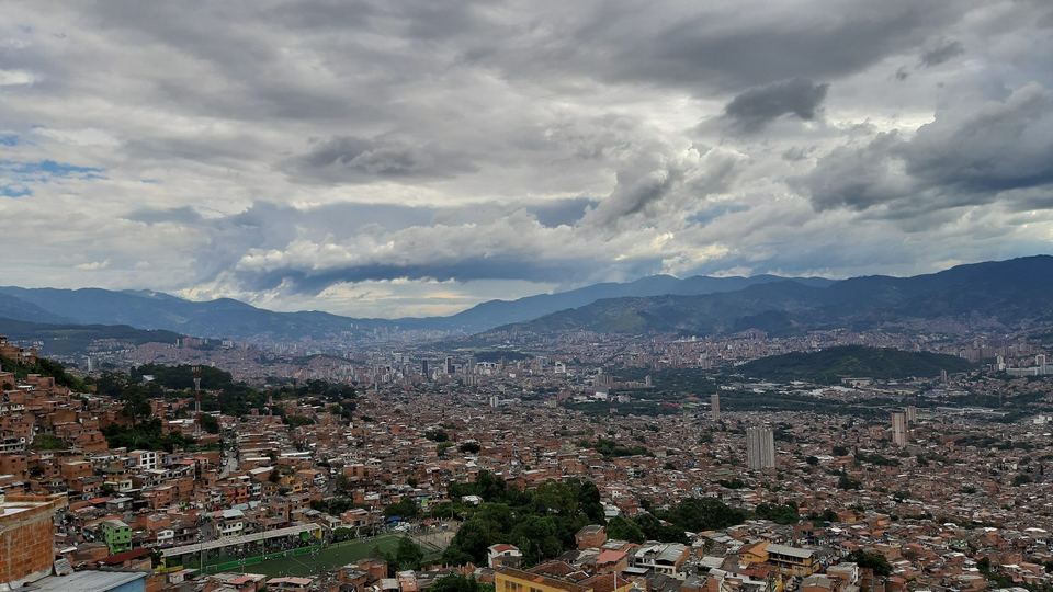 Panoramic view over Medellin hillside neighbourhoods seen from a Metrocable gondola