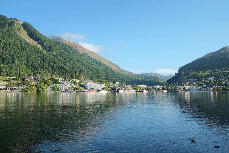 Morning light over Queenstown Bay and the town waterfront.