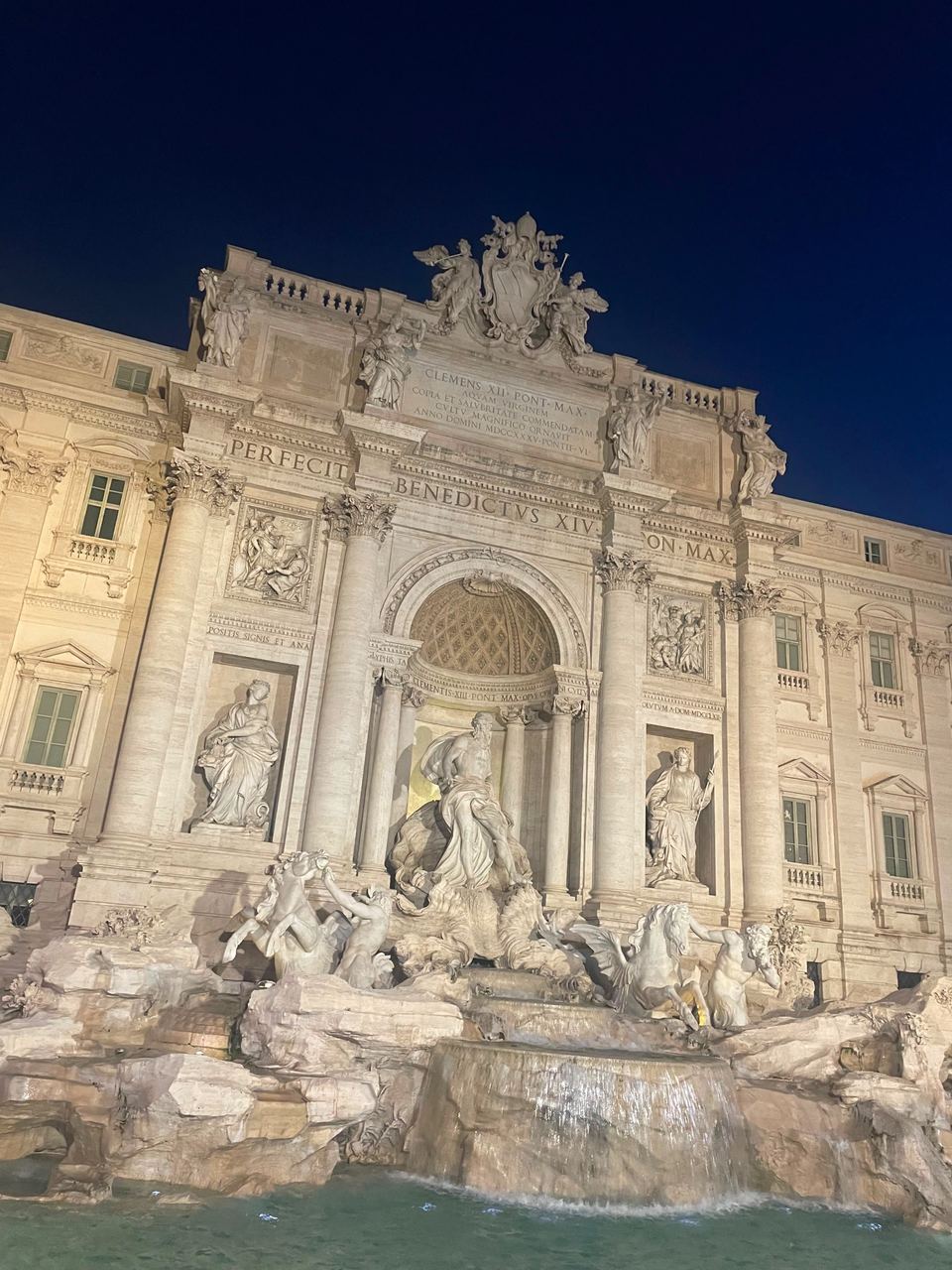illuminated fountain at night in Trevi Fountain, Rome