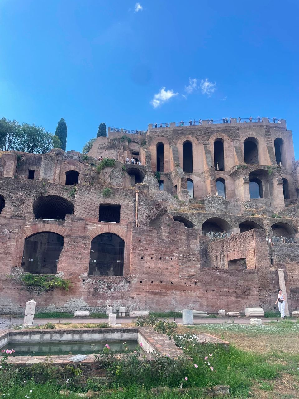 ancient ruins and garden pool in House of the Vestals, Roman Forum, Rome