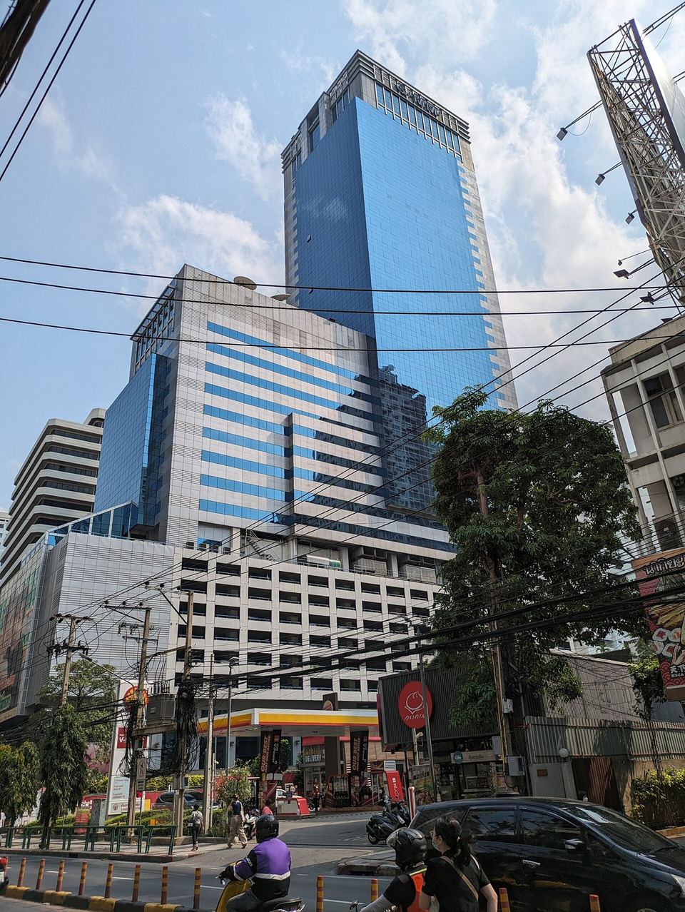The GMM Grammy Place tower on Sukhumvit Soi 21 in Bangkok, seen from street level